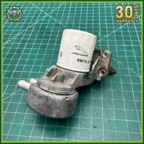 9w7e-6714-ba Jaguar 13-15 Xf 2.0l Engine Oil Cooler With Filter Adapter Mount Oem