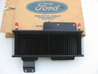 New Oem Ford E73Z-7A095-A Oil Cooler 1987-1991 Tempo, Mercury Topaz. Price: $35.92.