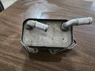 2005-2017 Audi Engine Oil Cooler Oem 06E-117-021-G Used. Price: $45.00.