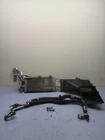 07-15 Bmw E9X N54 N55 Passenger Right Engine Oil Cooler Radiator / Lines Oem Used. Price: $225.00.