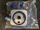 Engine Oil Cooler SK918140-NEW Box From Skyward Automotive Products. Price: $30.00.