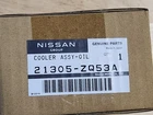 New Genuine Nissan Armada Titan Infiniti QX56 Engine Oil Cooler Oem 21305-ZQ53A. Price: $375.00.