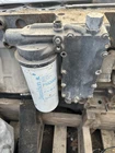 Cummins 8.3 Oil Cooler With Filter Housing Used. Price: $400.00.
