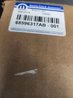 68596317AB Engine Oil Cooler 3.6 Mopar New. Price: $126.30.