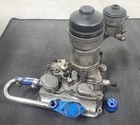 03-07 Ford 6.0L Engine Oil W/housing Assembly (blue Spring -newer Cooler) Used. Price: $300.00.