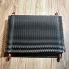 Long 703-4117 Transmission / Oil Cooler. Nos. Made In Canada 11.25 X9.5 X1.5 New. Price: $25.50.