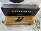 Mishimoto Mmint-ujg Universal Intercooler J-line, Gold New. Price: $320.00.
