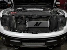 Mishimoto Transmission Cooler 2011-2014 Ford F-150 W/ Oem New. Price: $424.95.