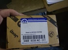 Genuine Mopar 04694338AC Engine Oil Cooler New. Price: $178.99.