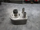 Ford BL3E-6A642-BB Oil Cooler New. Price: $119.95.