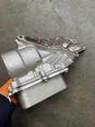 Mercedes Oil Cooler 2721800000 Without Gaskets Used. Price: $59.99.