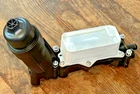 Engine Oil Cooler Filter Housing 68596318AB For 2011-16 Chrysler Dodge Ram 3.6L New. Price: $25.00.