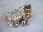 Porsche - Oil Cooler Housing Plate 944.107.149.5R Used. Price: $109.99.